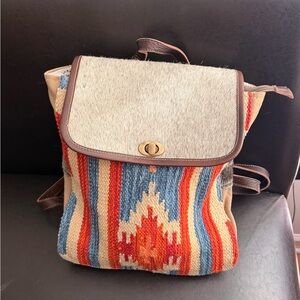 Myra Bag Vibrant Red and Blue Patterned Backpack with cowhide.